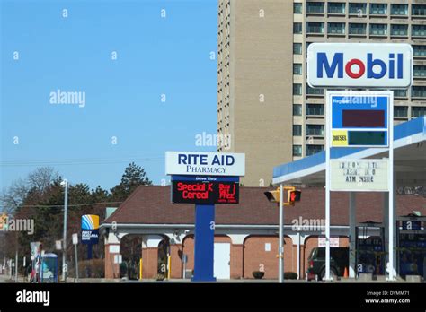 Rite Aid Pharmacy and Mobil petrol station sign Stock Photo - Alamy