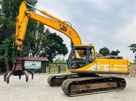 Jcb JS200 Tracked Excavator C W Hydraulic Rotating 5 Tine Scrap Grab