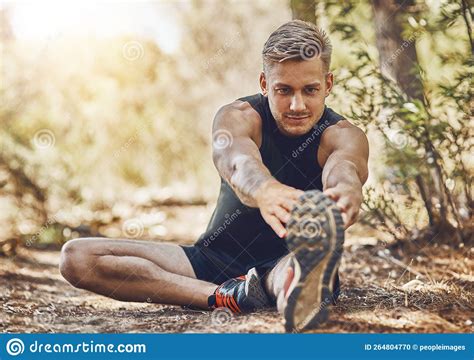 Stretching Before You Run Will Help Your Muscles A Young Man