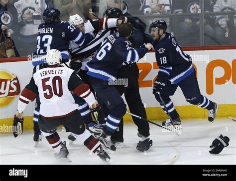 Winnipeg Jets Dustin Byfuglien 33 And Blake Wheeler 26 Go After