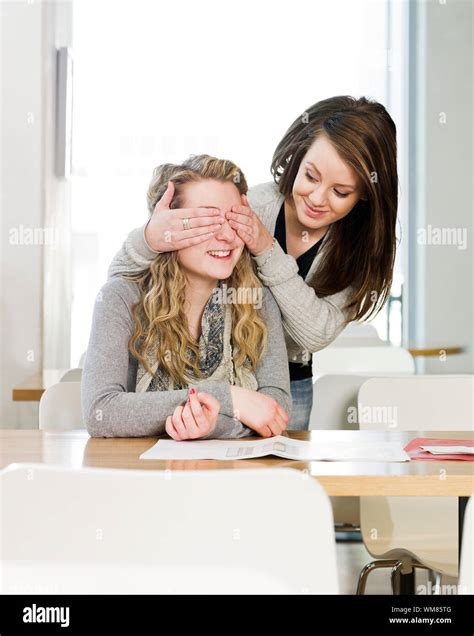 Two Girls Playing Peek A Boo Stock Photo Alamy