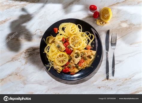 Italian Chicken Piccata Artichoke Hearts Capers Served Spaghetti Stock