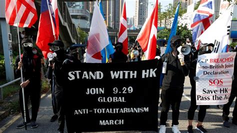 Hong Kong: Chinese flag burned as protests enter their 16th week ...