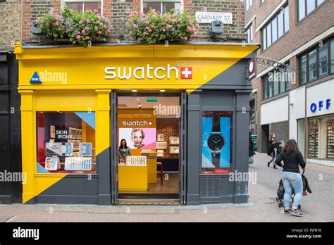 Swatch Shop Window On Carnaby Street Soho London W1 England Uk