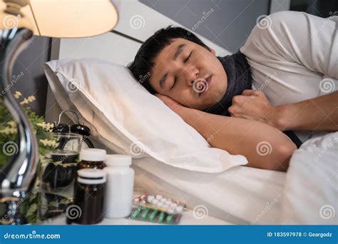 Sick Man Sleeping In Bed Stock Photo Image Of Asian 183597978