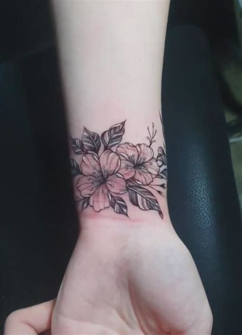 Best Wrist Tattoos To Make You Stand Out Flower Wrist Tattoos