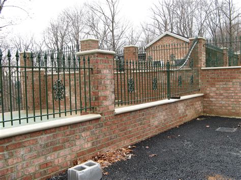 Iron Fence Atop A Brick Wall For Aesthetics And Security Island House