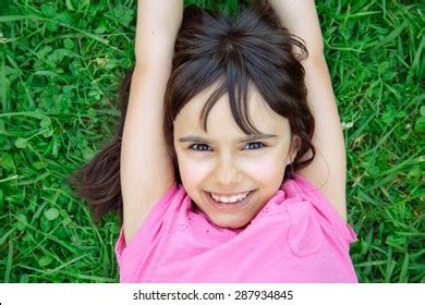 Cute Little Girl Lying Grass Smiling Stock Photo 287934863 | Shutterstock