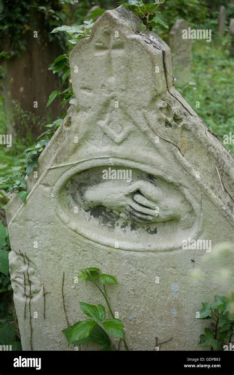 Square And Compasses And Shaking Hands Depicting Symbols Of Freemasonry