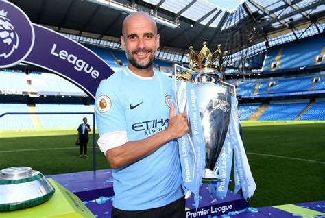 Pep Guardiola With The Premier League Trophy Mcfc