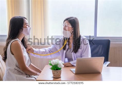 Female Doctor Wears Surgical Mask That Stock Photo 1772183195 ...