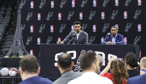 San Antonio Spurs draft pick Victor Wembanyama (left) speaks with ...