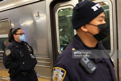 Nypd Officers Patrol The Subway Platform At The 36 Street Subway