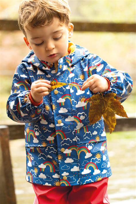 frugi puddle buster coat rainbow skies  thrifty stork