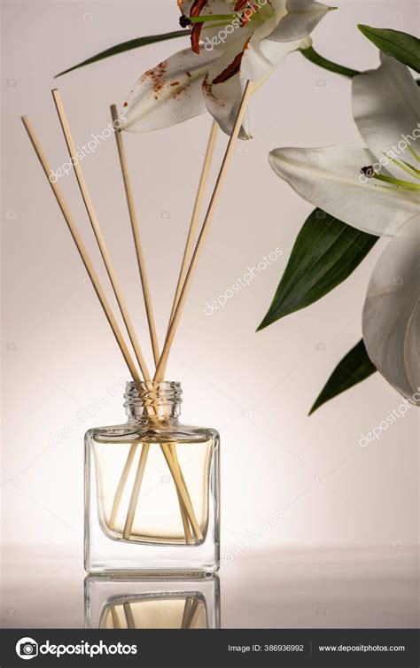 Wooden Sticks Perfume Bottle Lily Flowers Beige Background Stock Photo