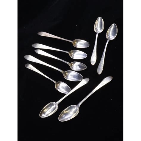 A Collection Of Antique Irish And English Silver Teaspoons Mixed Dates