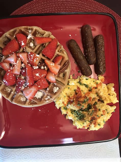 Waffle With Pecans Powdered Sugar And Strawberries Vegan Breakfast