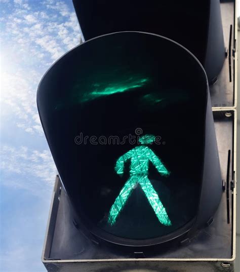 Green And Red Traffic Lights For Pedestrians And Cars Stock Photo