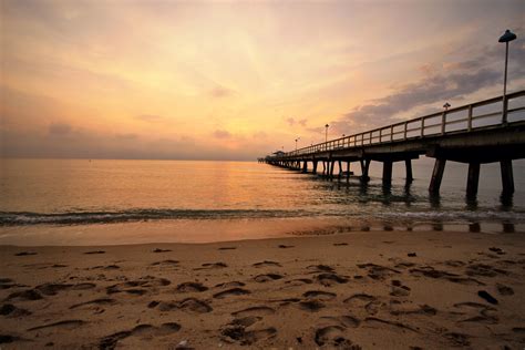 Free Images - beach pier sunrise ocean