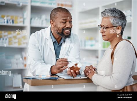 Pharmacy Black Man And Woman With Healthcare Medicine And Conversation