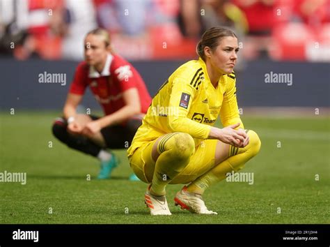 Manchester United Goalkeeper Mary Earps Right Reacts Following The