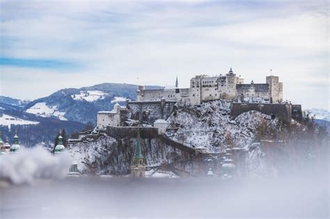 Premium Photo | Snowy fortress hohensalzburg in the winter salzburg austria