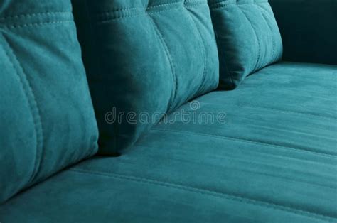 Closeup of Trendy Blue Sofa with Cushions on it.Velvet Texture of Comfortable Couch Stock Photo ...