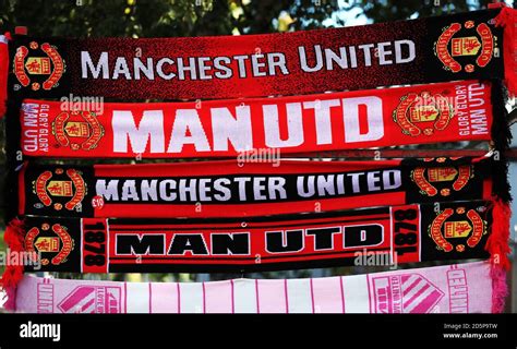 A Stall Sells Manchester United Scarves Outside Old Trafford Stock