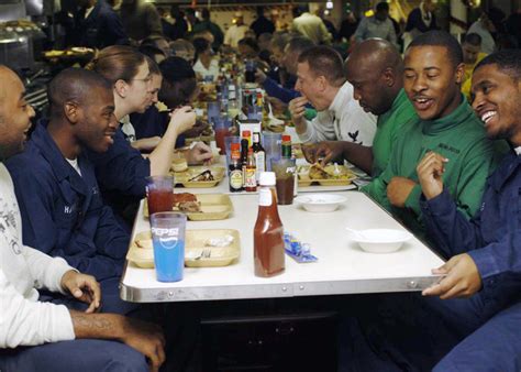 U S Navy Sailors Enjoy A Thanksgiving Day Meal Together Onboard The