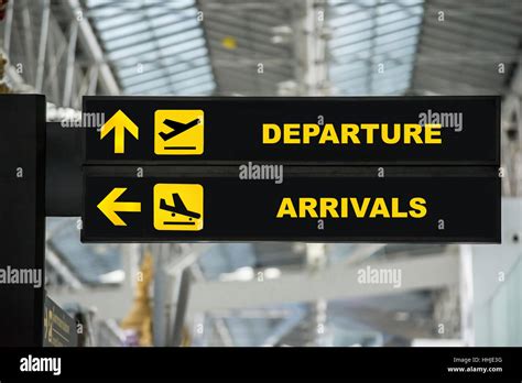 Airport Departure And Arrival Information Board Sign In Terminal At