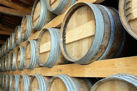 Barrels Stored In A Cellar Photo Background And Picture For Free