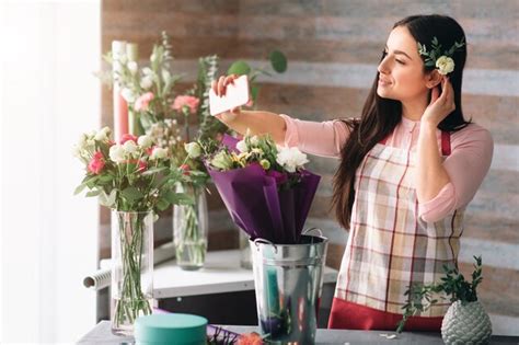 Premium Photo Female Florist At Work Pretty Young Dark Haired Woman