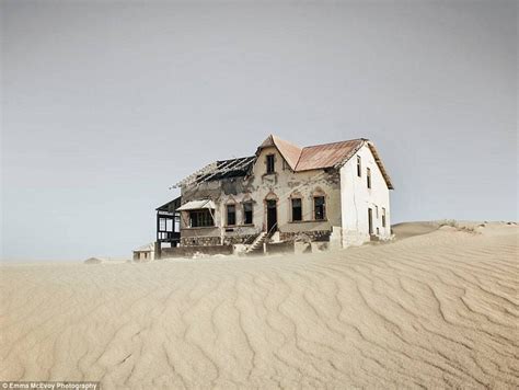 Eerie Photographs Of A House Being Reclaimed By Desert Sand Capture The