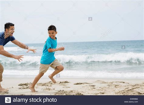 Father Son Running On The Beach Hi Res Stock Photography And Images Alamy