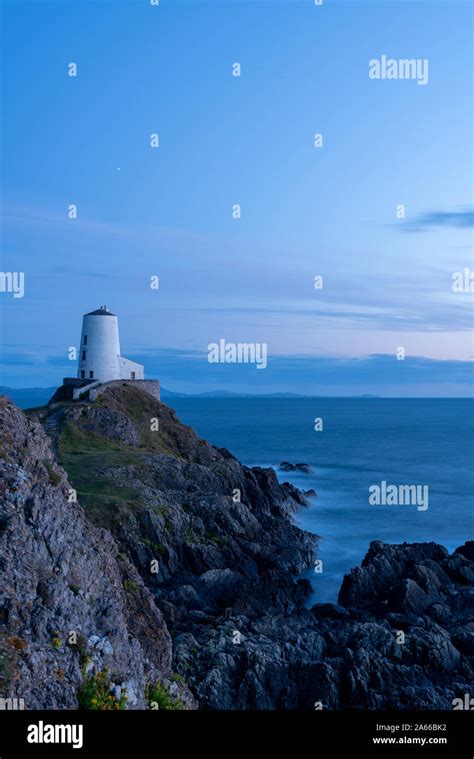 The Llanddwyn island lighthouse, Twr Mawr at Ynys Llanddwyn on Anglesey ...