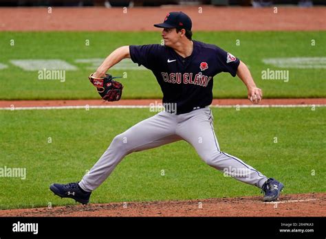 Cleveland Guardians starting pitcher Logan Allen throws a pitch to the ...