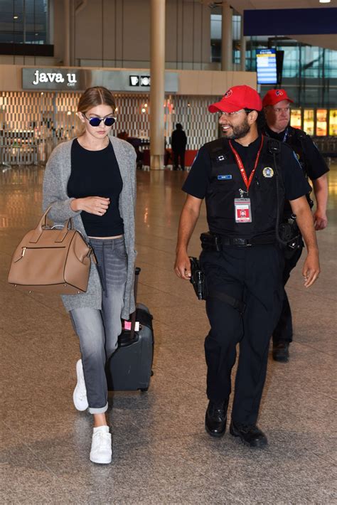 GIGI HADID at Pierre Elliott Trudeau Airport in Montreal 06/05/2015