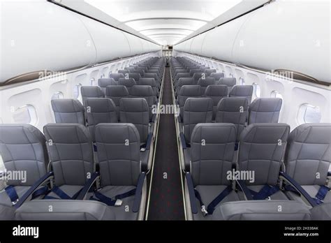 Typical interior of a passenger plane Stock Photo - Alamy