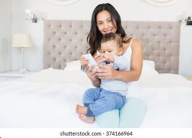 Happy Brunette Holding Her Baby Using Stock Photo Shutterstock