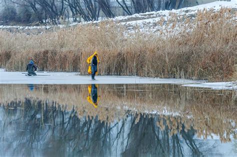 Fishing on frozen lake in Van