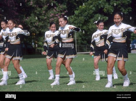 San Antonio Texas Hispanic High School Cheerleaders Perform A Routine