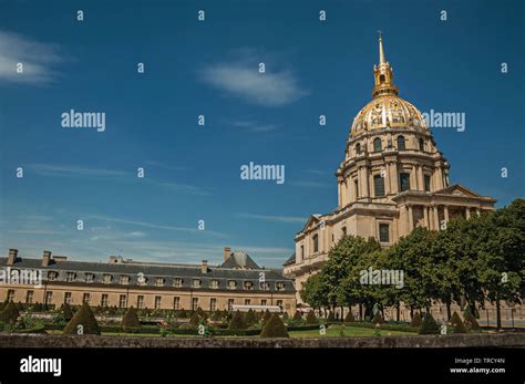 Trees In The Gardens Of Les Invalides Palace With The Golden Dome In