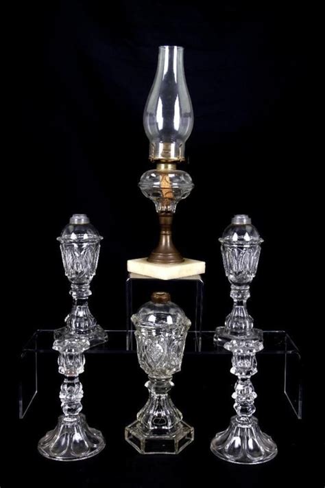 Sold Price Four Molded Glass Oil Lamps Thc Invalid Date Pdt