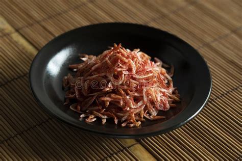 Dried Sakura Shrimps On A Plate Placed On A Bamboo Luncheon Mat Stock