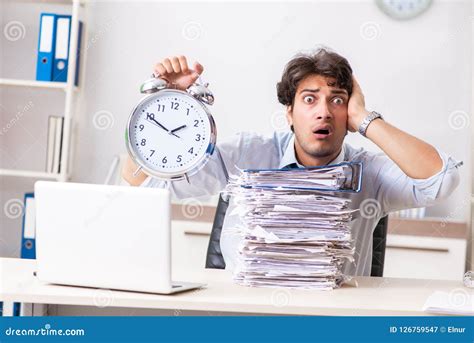 Overloaded Busy Businessman Having Lunch At Work Stock Image