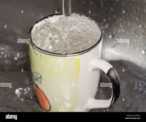 Overflowing Cup Hi Res Stock Photography And Images Alamy