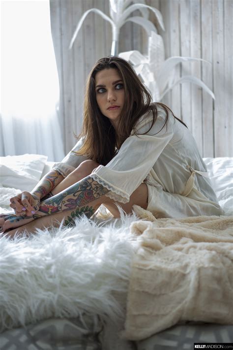 Slender Inked Babe Rocky Emerson Posing In Bed MILF Fox