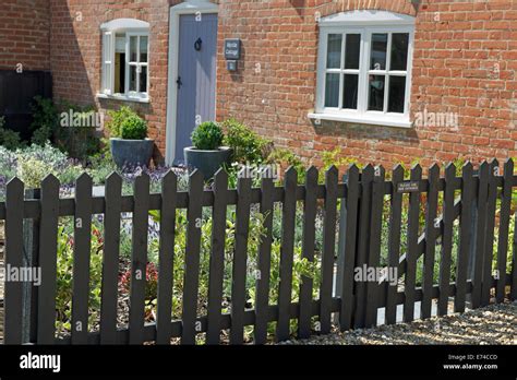 Wooden garden fence Stock Photo - Alamy