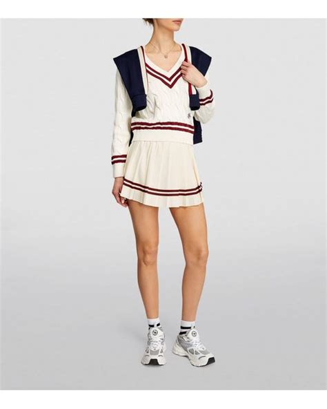 Sporty Rich Logo Pleated Mini Skirt In Natural Lyst