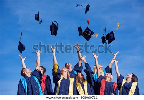 High School Students Graduates Tossing Hats Stock Photo 308060711